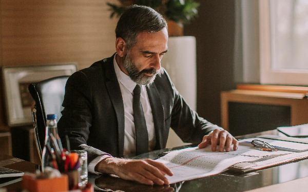 Man looking over financials